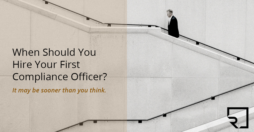 man on stairs with text overlay saying when should you hire your first compliance officer